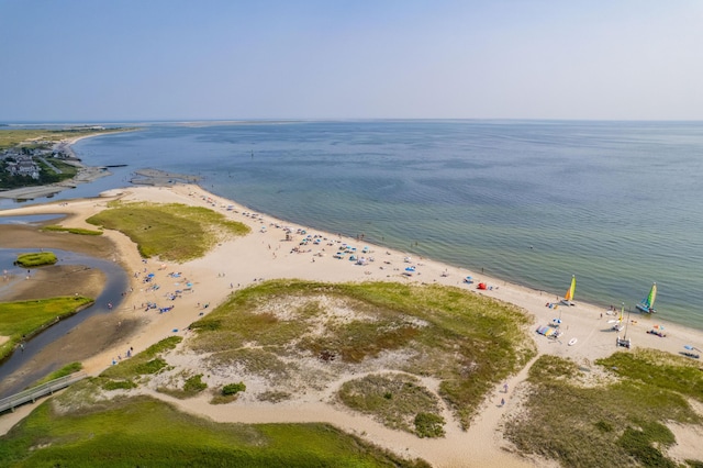 aerial view with a beach view and a water view