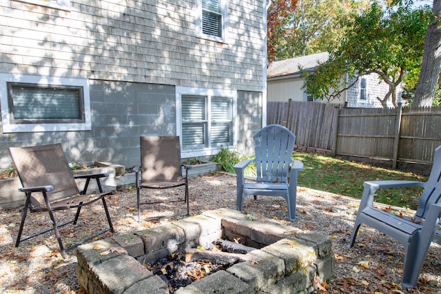 view of patio with an outdoor fire pit