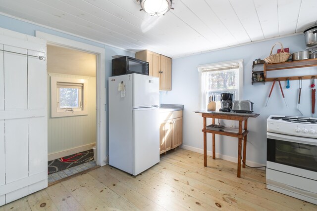 kitchen featuring light hardwood / wood-style floors, wooden ceiling, white appliances, and light brown cabinets