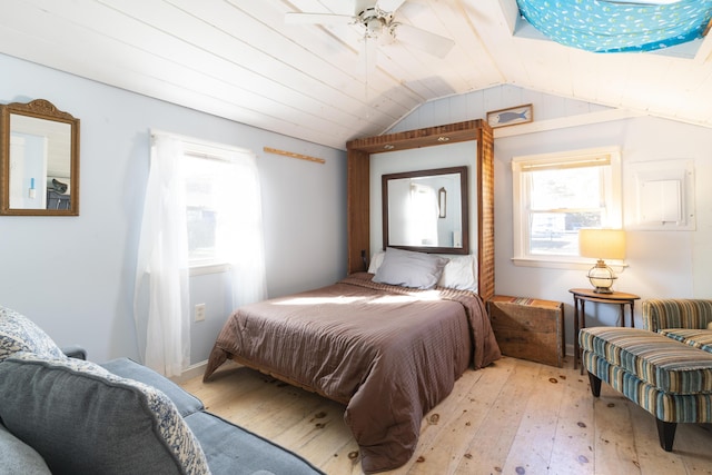 bedroom featuring light wood-type flooring, ceiling fan, and lofted ceiling