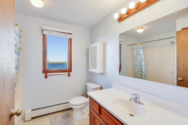 bathroom with a baseboard radiator, toilet, and vanity