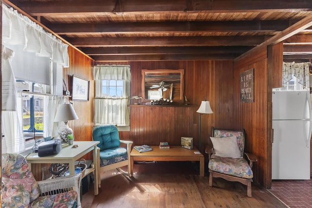 5 Spurr Rd, Pocasset, MA 02559 - living area featuring wooden ceiling with exposed beams, wooden walls, and wood finished floors