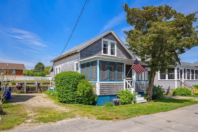 5 Spurr Rd, Pocasset, MA 02559 - bungalow-style home with a sunroom
