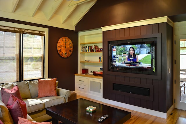 71 Stoney Hill Rd, Tisbury, MA 02568 - living area featuring lofted ceiling, light wood-type flooring, and healthy amount of natural light