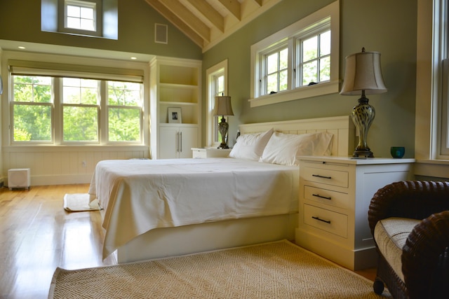 71 Stoney Hill Rd, Tisbury, MA 02568 - bedroom with wood finished floors, high vaulted ceiling, and beam ceiling