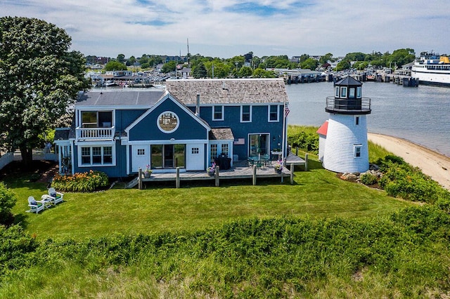 107 Channel Point Rd, Hyannis, MA 02601 - rear view of house with a deck with water view and a yard