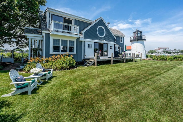 107 Channel Point Rd, Hyannis, MA 02601 - rear view of property featuring a lawn, a balcony, and a wooden deck