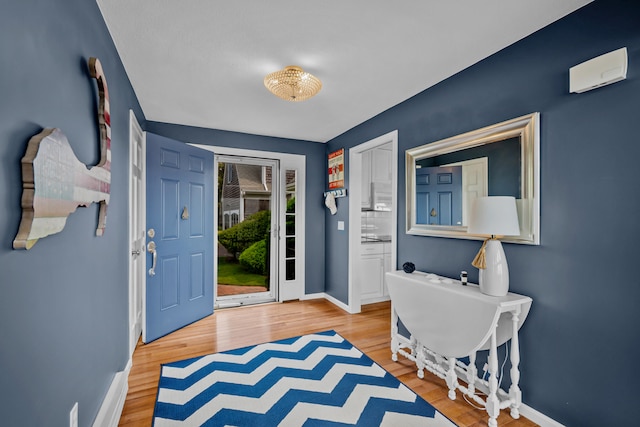 7 Dunes Rd, Harwich Port, MA 02646 - entrance foyer with baseboards and wood finished floors