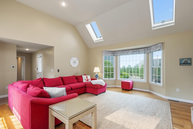 7 Dunes Rd, Harwich Port, MA 02646 - living room with a skylight, lofted ceiling, wood finished floors, and recessed lighting