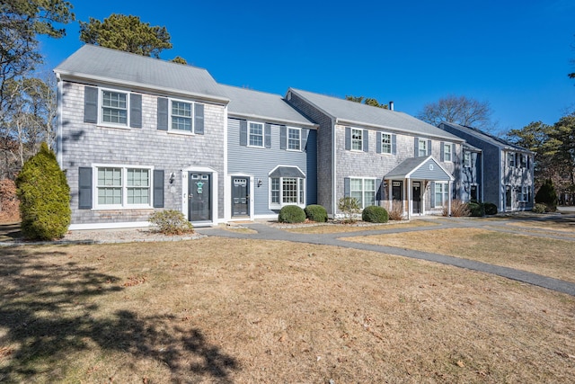 view of front of house featuring a residential view and a front yard