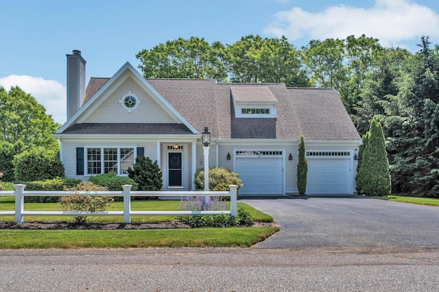 80 Schooner Ln, Hyannis, MA 02601 - view of front facade with asphalt driveway, a garage, a chimney, and a shingled roof