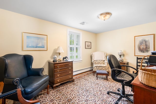 home office with a baseboard radiator and wood finished floors