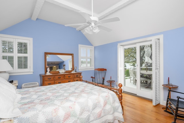 bedroom with access to outside, wood finished floors, and a ceiling fan