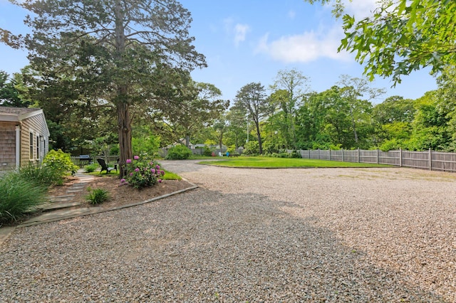 280 Schoolhouse Rd, Eastham, MA 02642 - view of yard with view of scattered trees and driveway