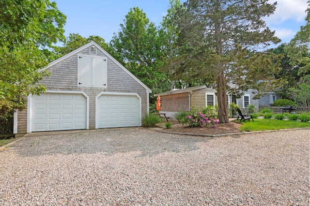 280 Schoolhouse Rd, Eastham, MA 02642 - view of front of property featuring an outbuilding and gravel driveway