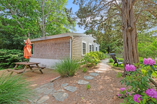 280 Schoolhouse Rd, Eastham, MA 02642 - view of home's exterior with a patio