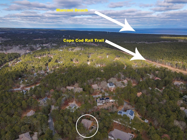 35 Pine Field Rd, Wellfleet, MA 02667 - aerial view of a heavily wooded area and a nearby body of water