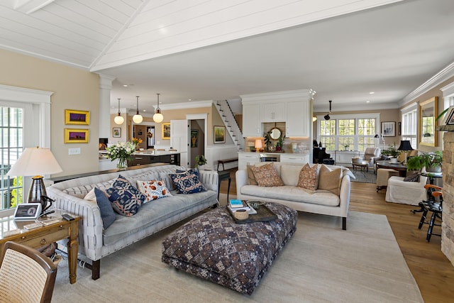 27 Gully Ln, East Sandwich, MA 02537 - living area with light wood-style floors, crown molding, stairs, recessed lighting, and vaulted ceiling