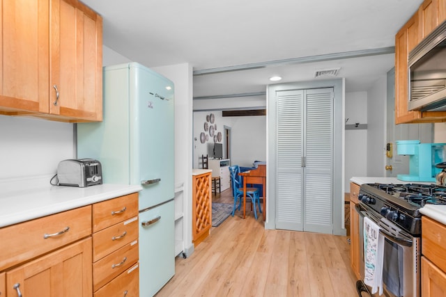 22 Wixon Rd, Dennis Port, MA 02639 - kitchen featuring appliances with stainless steel finishes, light wood finished floors, light countertops, and recessed lighting