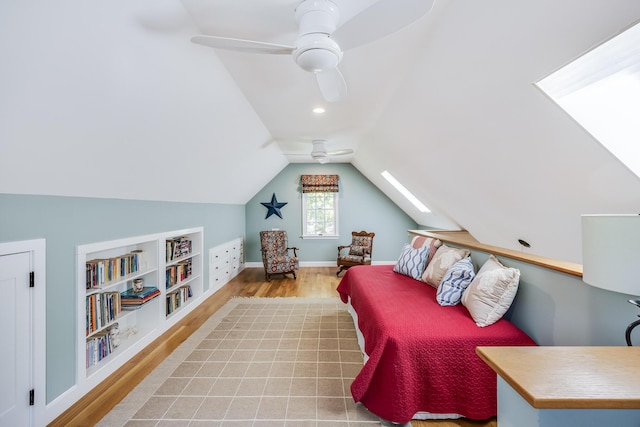 20 Hoyt Rd, Eastham, MA 02642 - bedroom featuring wood finished floors, a skylight, ceiling fan, and lofted ceiling
