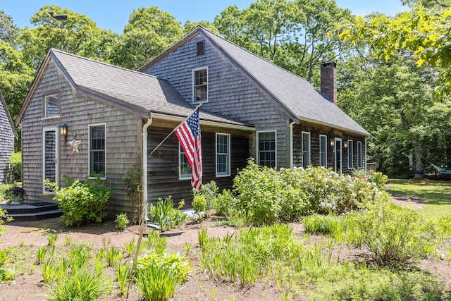 20 Hoyt Rd, Eastham, MA 02642 - shingle-style home featuring a chimney and a shingled roof