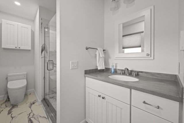 full bath featuring toilet, vanity, baseboards, marble finish floor, and a shower stall