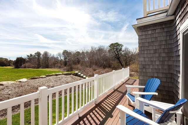 deck featuring a yard