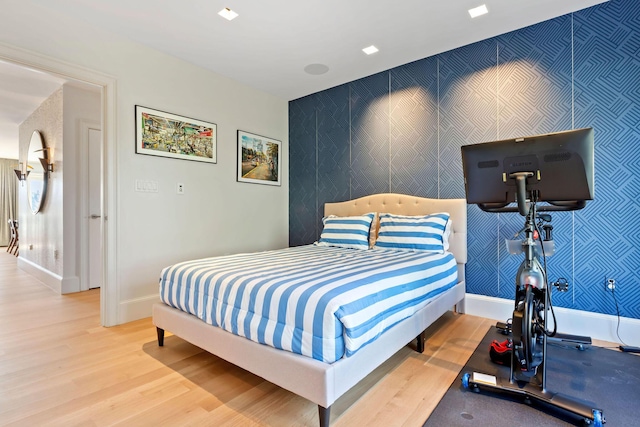 bedroom with light wood-type flooring