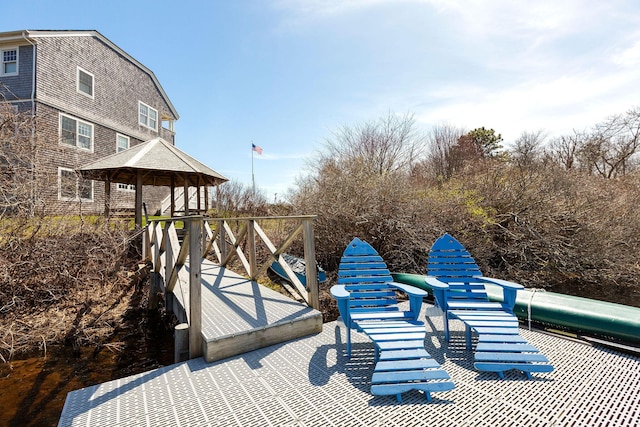 view of dock with a playground