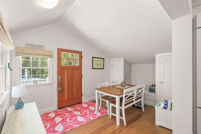33 Beach Rd, Orleans, MA 02653 - entryway featuring lofted ceiling, light wood-type flooring, and baseboards