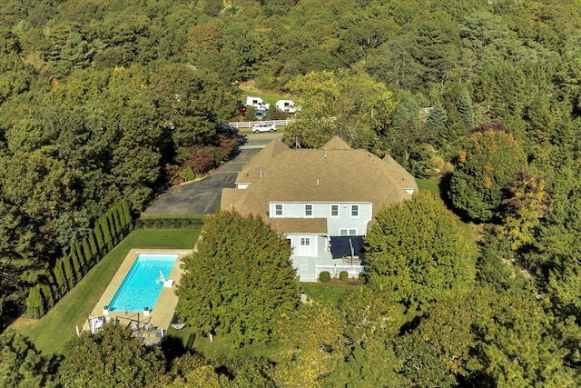 bird's eye view with a forest view