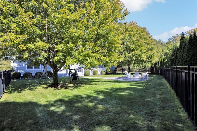 view of yard with a patio and a fenced backyard
