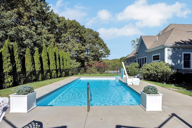 view of pool with a fenced backyard, a fenced in pool, and a patio