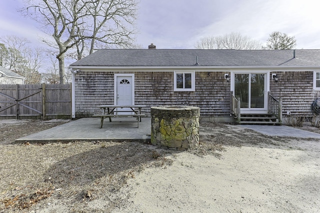 rear view of property with a patio