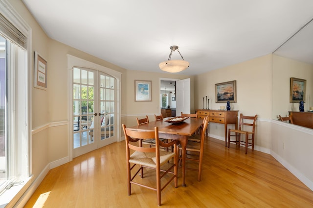 142 Greely Ave, Centerville, MA 02632 - dining area with light wood-style floors and french doors