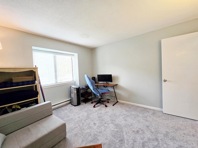office space with a baseboard radiator, carpet, and baseboards