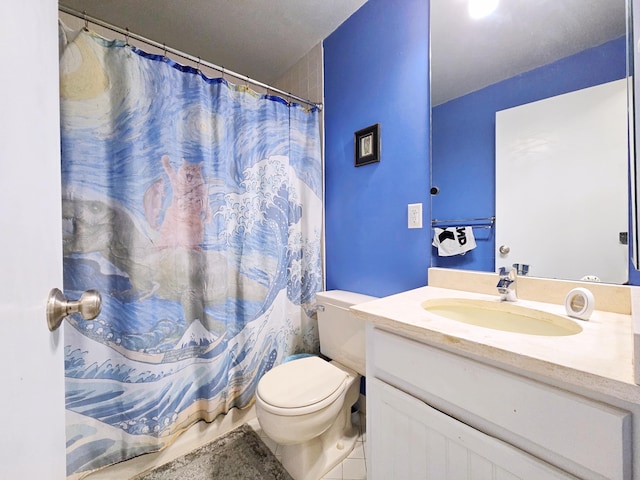 bathroom with tile patterned flooring, toilet, vanity, and a shower with shower curtain