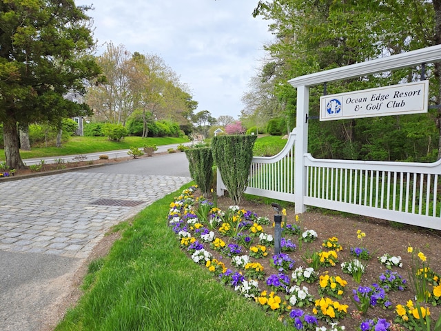 surrounding community featuring fence