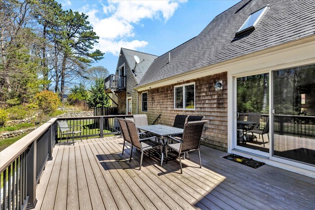 deck featuring outdoor dining space