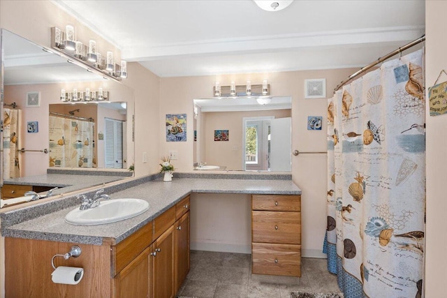 bathroom with a shower with shower curtain, tile patterned flooring, visible vents, and vanity