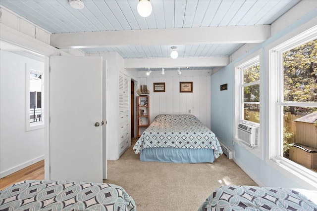 bedroom with wood ceiling, light carpet, and beamed ceiling