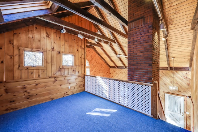 additional living space with high vaulted ceiling, wooden walls, beamed ceiling, carpet, and wood ceiling