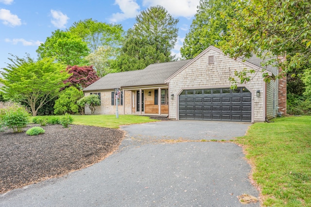 290 Riverview Ln, Centerville, MA 02632 - ranch-style house featuring driveway, a garage, and a front yard