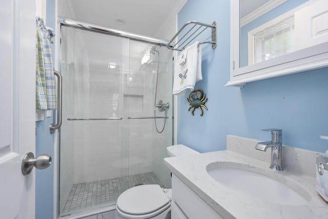 290 Riverview Ln, Centerville, MA 02632 - bathroom featuring ornamental molding, a shower stall, toilet, and vanity