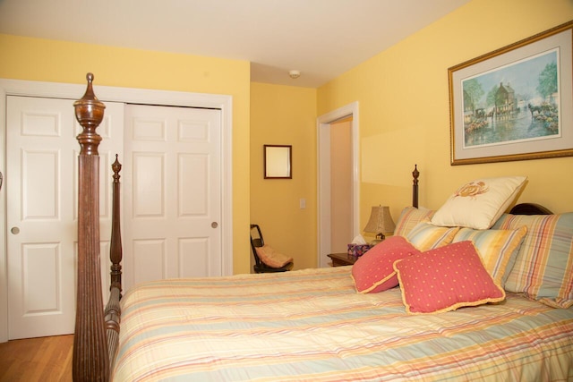bedroom featuring wood finished floors