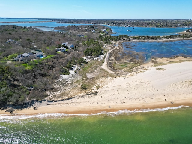 aerial view of waterfront with a beach