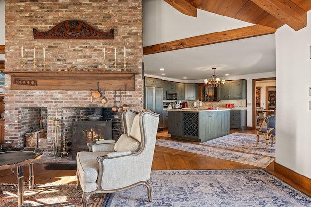 living room featuring light wood-style flooring, a chandelier, and recessed lighting