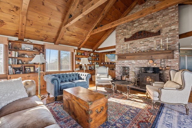 25 Wikis Way, Chatham, MA 02633 - living area featuring wood finished floors, a wooden ceiling with exposed beams, high vaulted ceiling, and a wood stove
