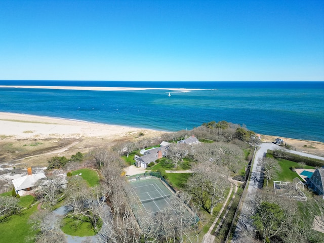 aerial view of property's location featuring unending shoreline