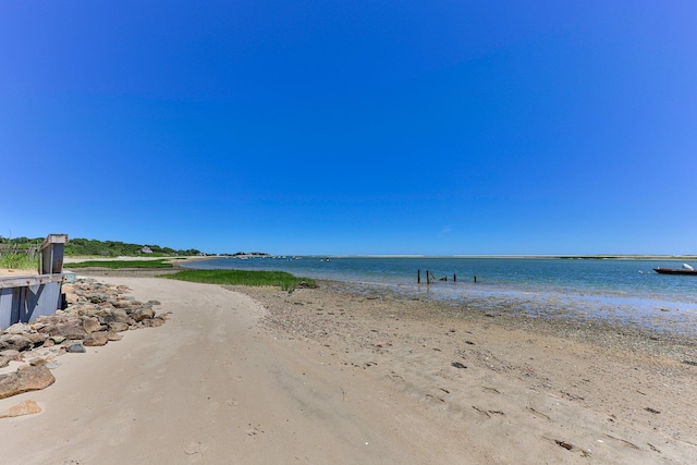 view of water feature with a beach view